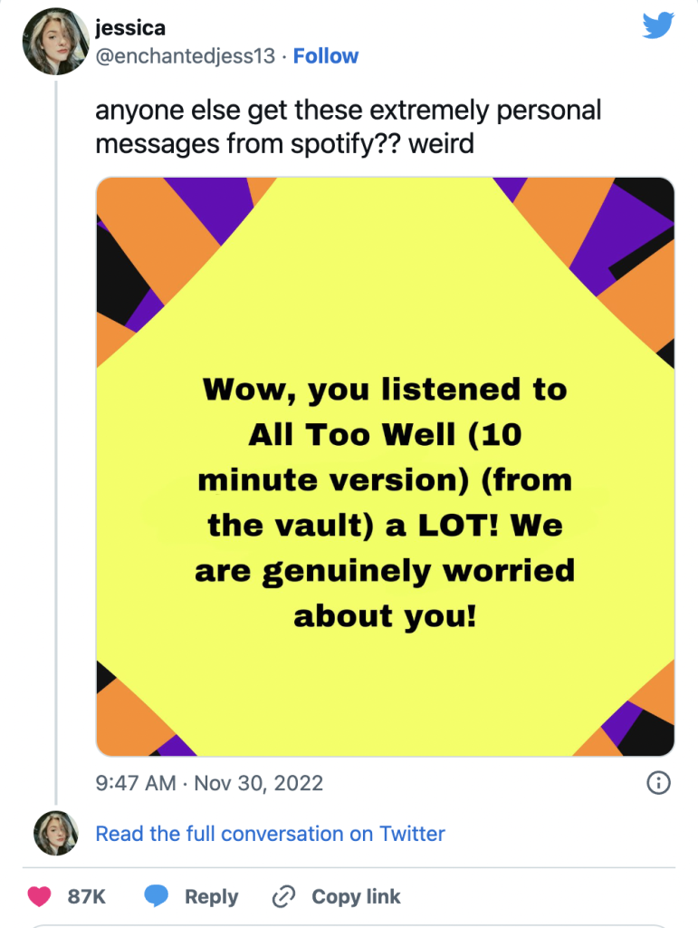 A screenshot of a tweet from @enchantedjess13 that features a Spotify wrapped graphic. The tweet above the graphic reads, 'Anyone else get these extremely personal messages from spotify?? weird' and the text on the graphic reads, 'Wow, you listened to All Too Well (10 minute version) (from the vault) a LOT! We are genuinely worried about you!'