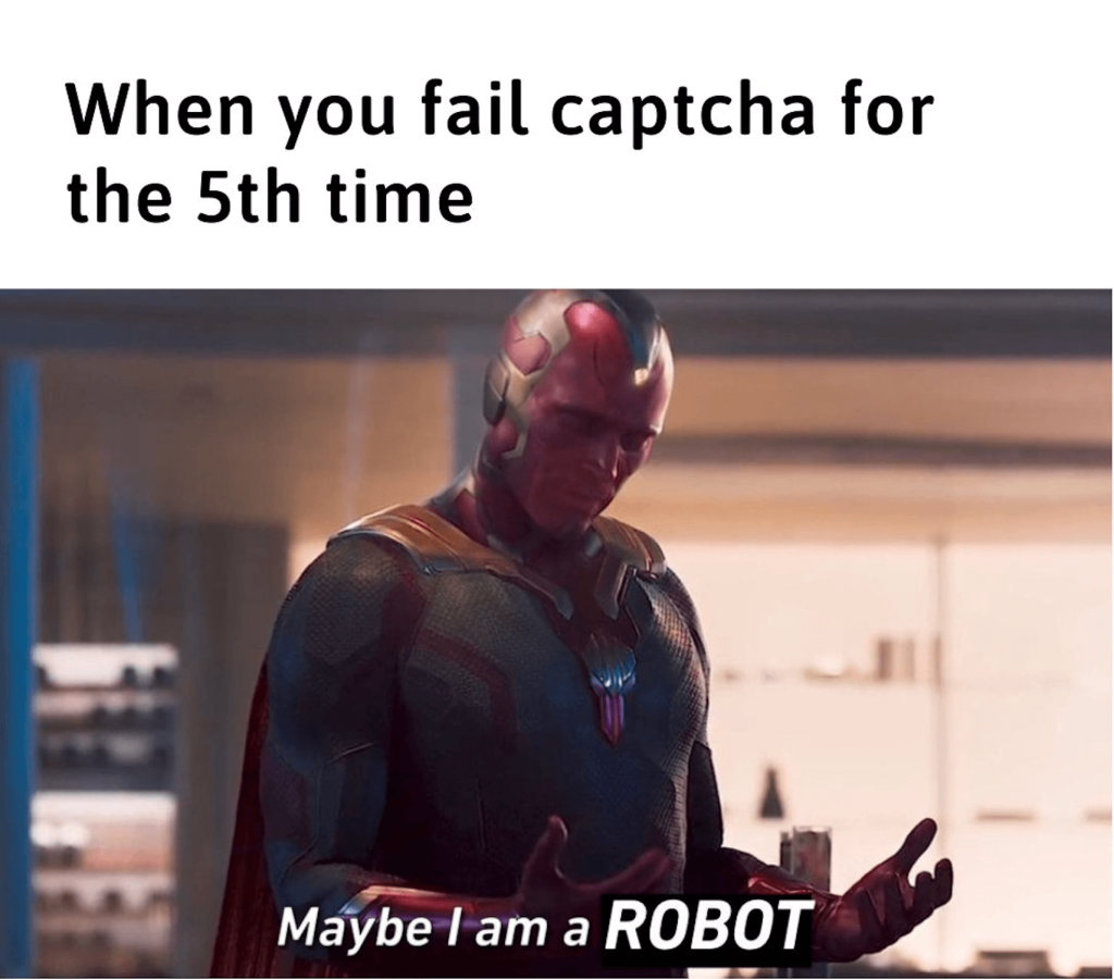 Vision from the Marvel movies tilts his chin downward with eyes closed and holds his hands out in front of himself, palms up. Above him is text that reads, 'When you fail captcha for the 5th time,' and below him is text that reads, 'Maybe I am a Robot.'